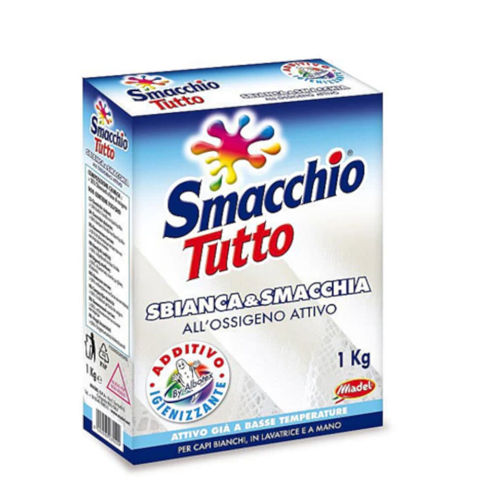 "Smacchiotutto Polvere Additivo 1 kg – Предна страна на опаковката, показваща продукта и акцент върху ензимната формула за премахване на петна."