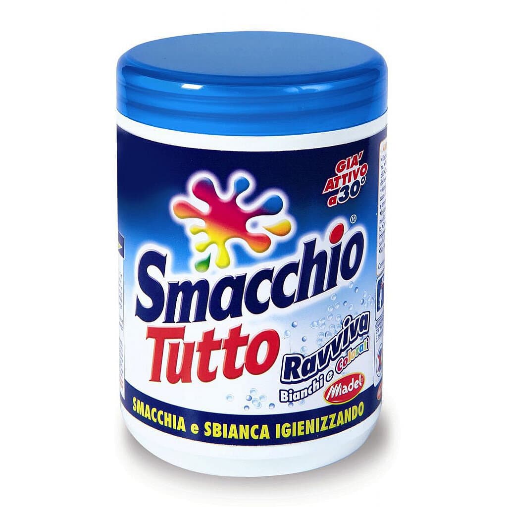 "Smacchiotutto Polvere 600 gr – Предна страна на опаковката, показваща продукта и акцент върху ензимната формула с активен кислород."