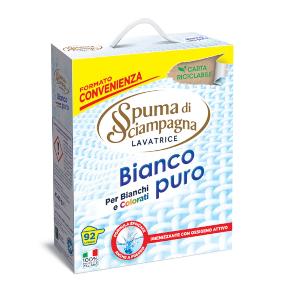 Опаковка на Spuma di Sciampagna Lavatrice in Polvere Bianco Puro Valigetta (предна част) с изображение на продукта и бели материи.